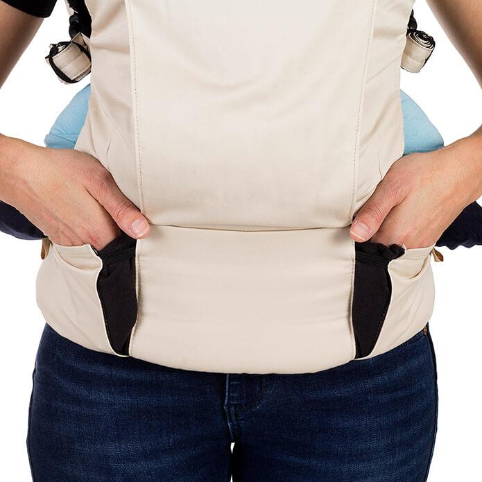 mountain buggy juno baby carrier in sand beige colour has storage pockets_sand